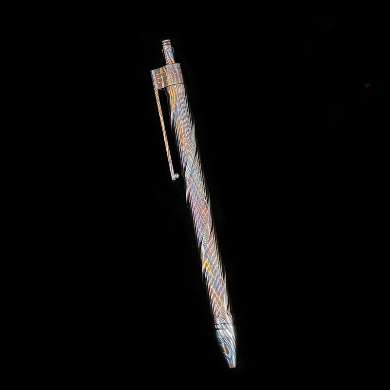 Damascus Tactical Pen – Titanium with CNC Engraved Titanium / Zirconium / Steel Writing detail image - detail view 13