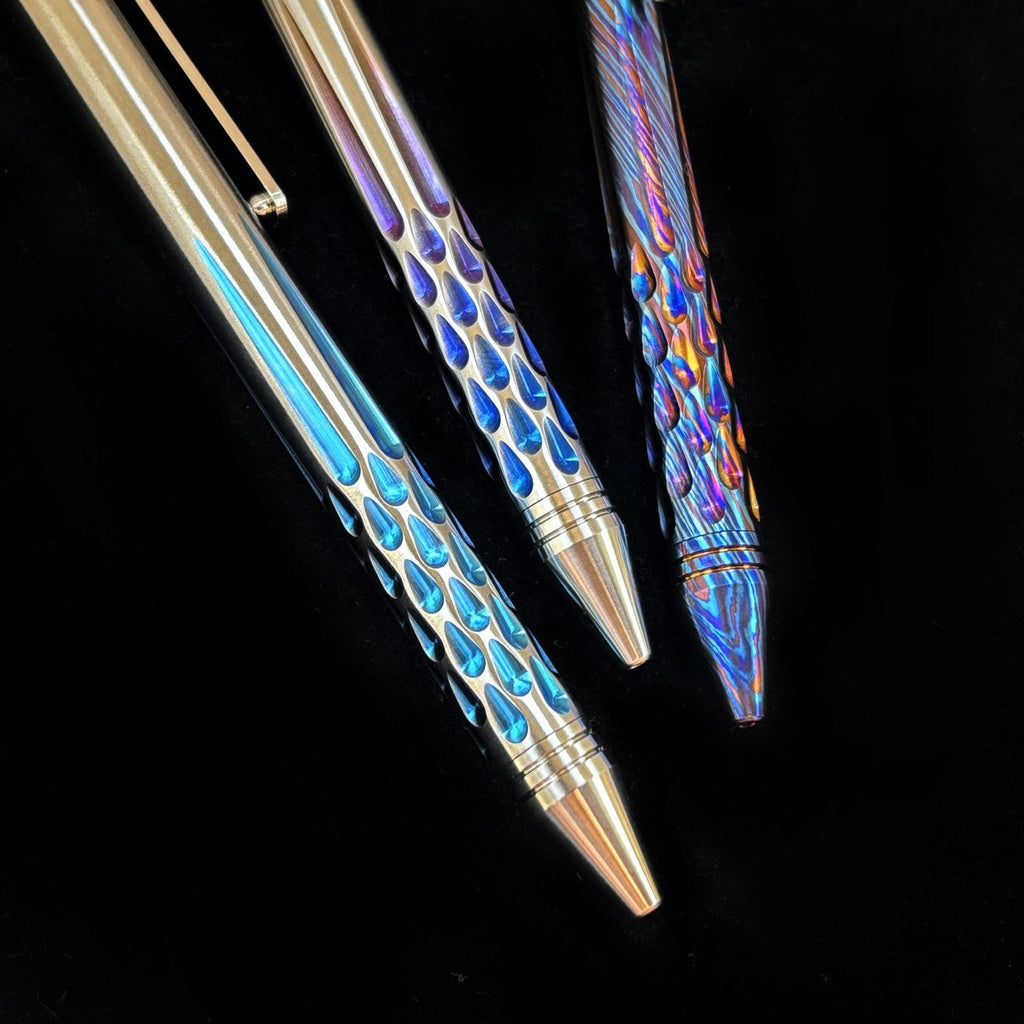 Damascus Tactical Pen – Titanium with CNC Engraved Titanium / Zirconium / Steel Writing detail image - detail view 6